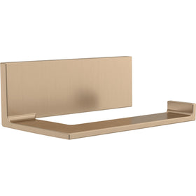 Delta Vero toilet paper holder in champagne bronze mounted on wall for space-saving storage
