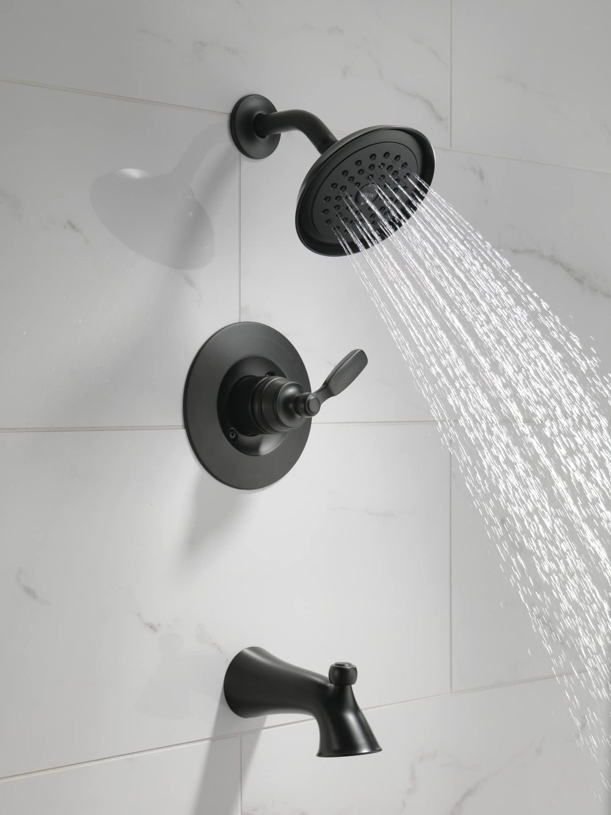 Delta Woodhurst 14 Series matte black single-spray shower head for focused water flow.