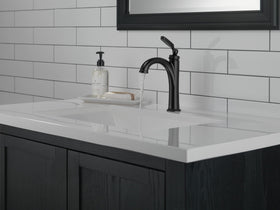 Delta Woodhurst matte black faucet side profile highlights clean lines