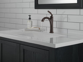 Delta Woodhurst side view shows single-hole compatibility for vanities