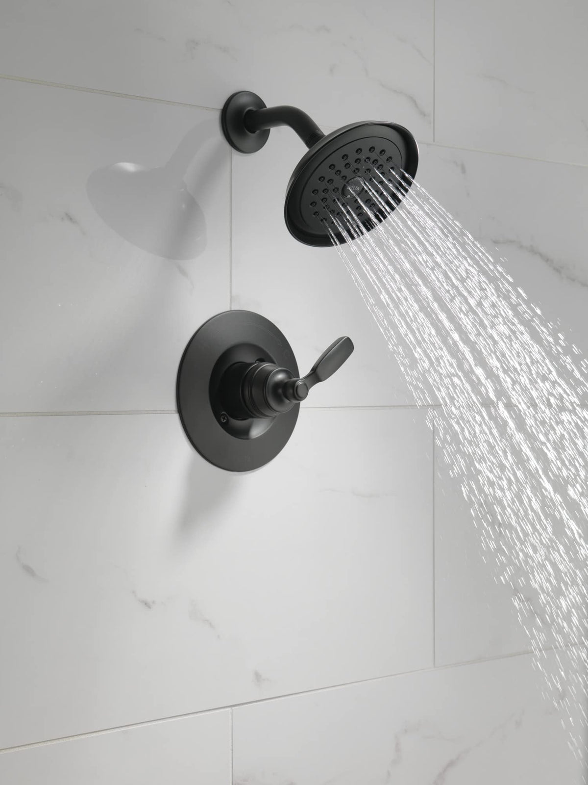 Delta Woodhurst valve trim matte black showing cohesive design.