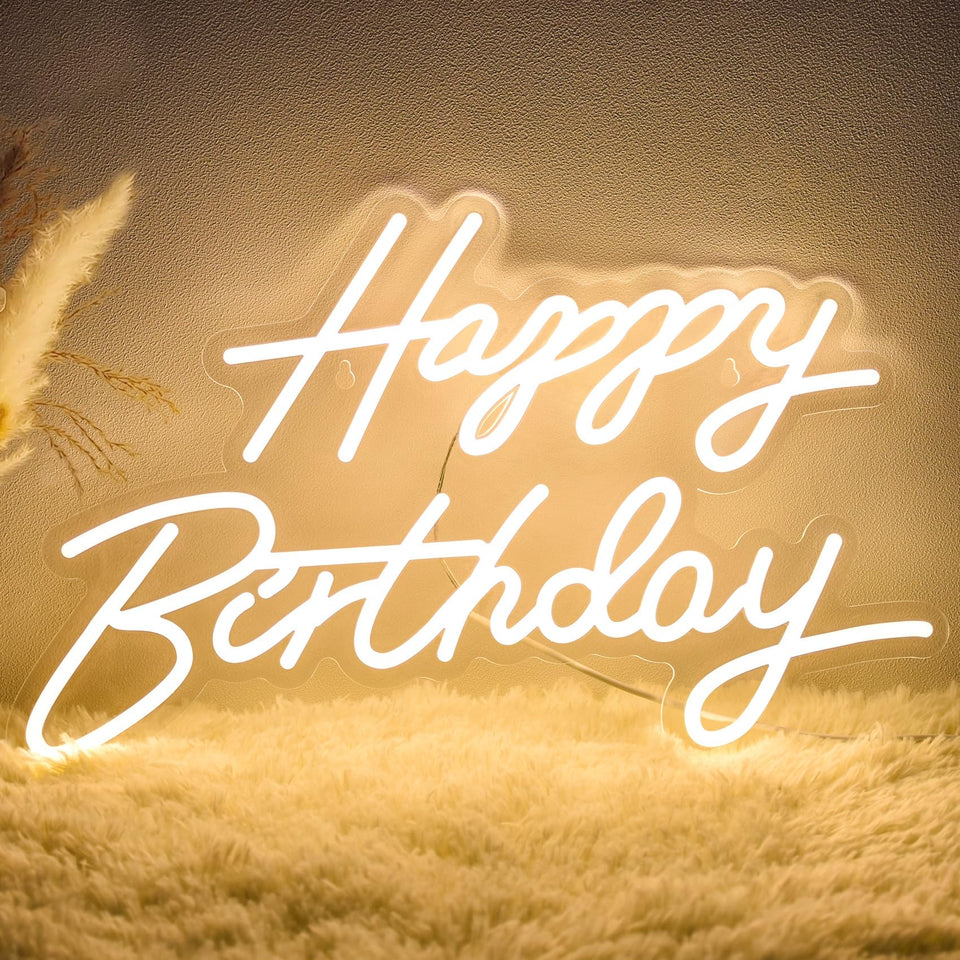 Dengduoduo Happy Birthday neon sign on wall adds warm, festive backdrop for photos.