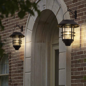 DERAYSION solar lantern with glass and metal construction adds durable ambient lighting