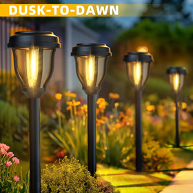 DERAYSION solar pathway light with warm glow enhances curb appeal and ambient garden lighting.