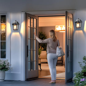 DERAYSION solar wall lantern with motion sensor for automatic outdoor lighting.