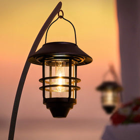 Derynome solar lantern hanging on hook for easy exterior lighting.
