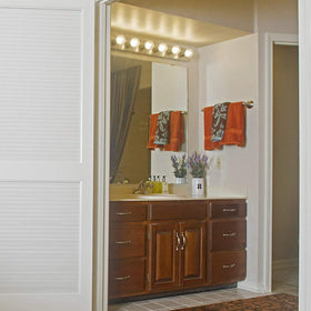 Design House 519298 wall-mount vanity light mounted cleanly with no visible wires.