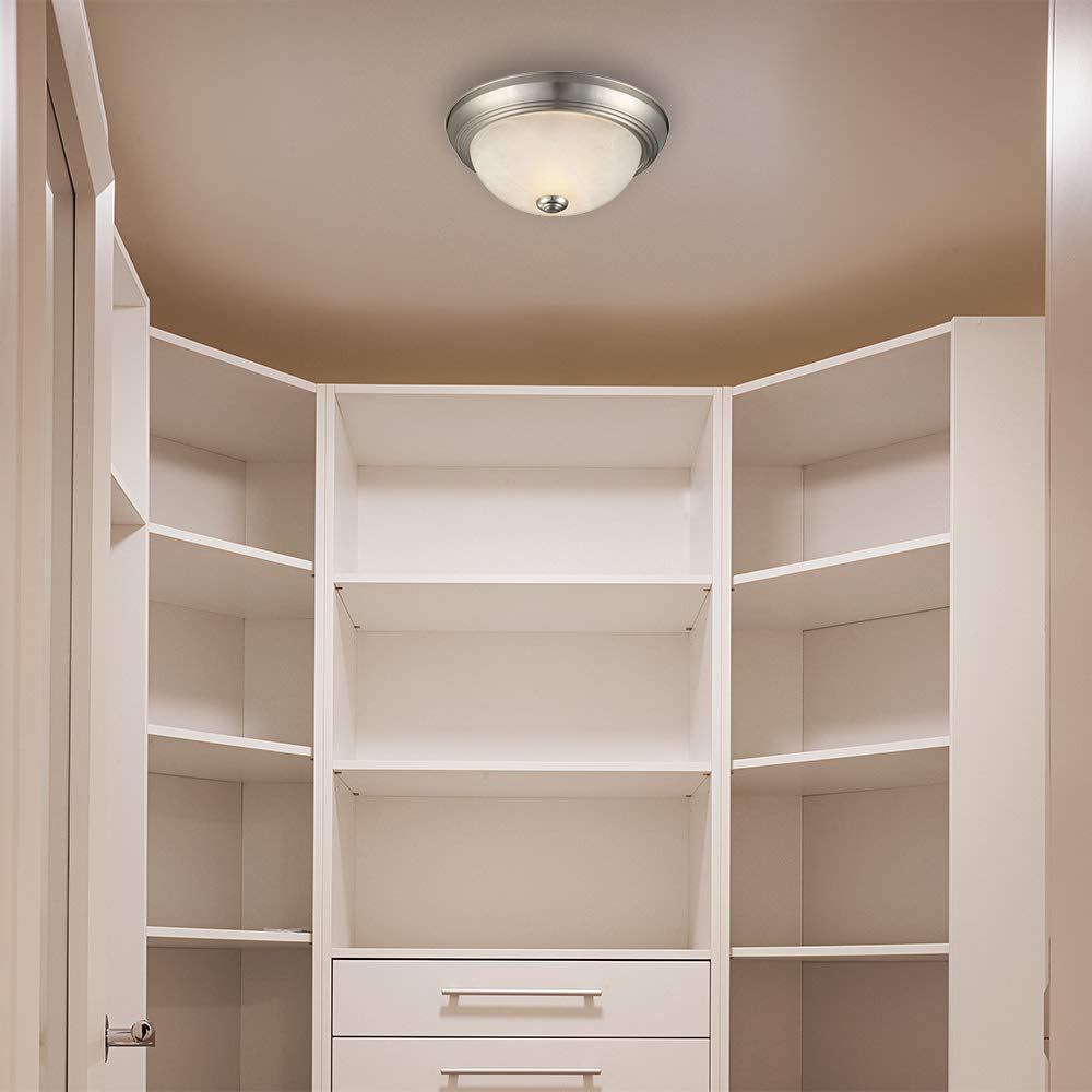 Bedroom setup with Design House flush mount for space-saving illumination.
