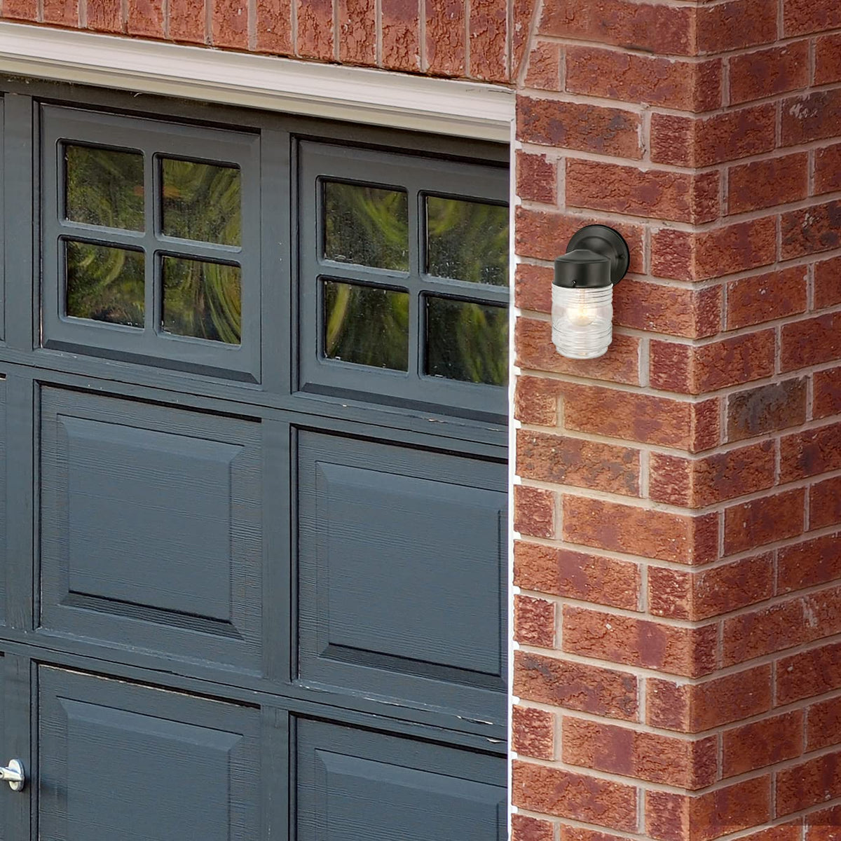 Design House Jelly Jar Wall Light supports dimming with compatible switches.