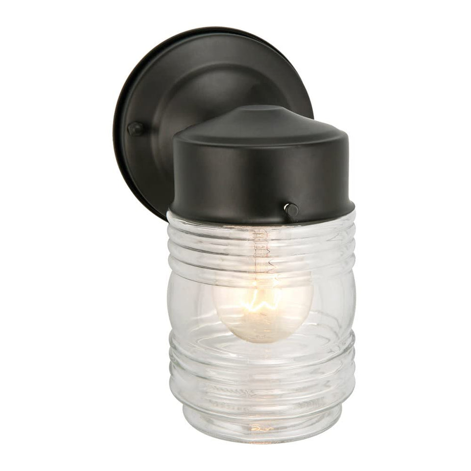 Design House Jelly Jar Wall Light with ribbed glass shade for outdoor ambiance.