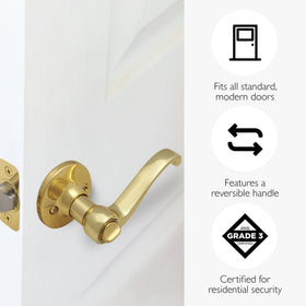 Design House Scroll Privacy Door Lever polished brass faceplate highlighting reversible installation.