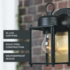 Designers Fountain Ivy Trail garage entrance light enhances nighttime visibility.