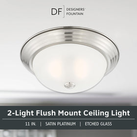 DESIGNERS FOUNTAIN satin platinum etched glass shade softens light.