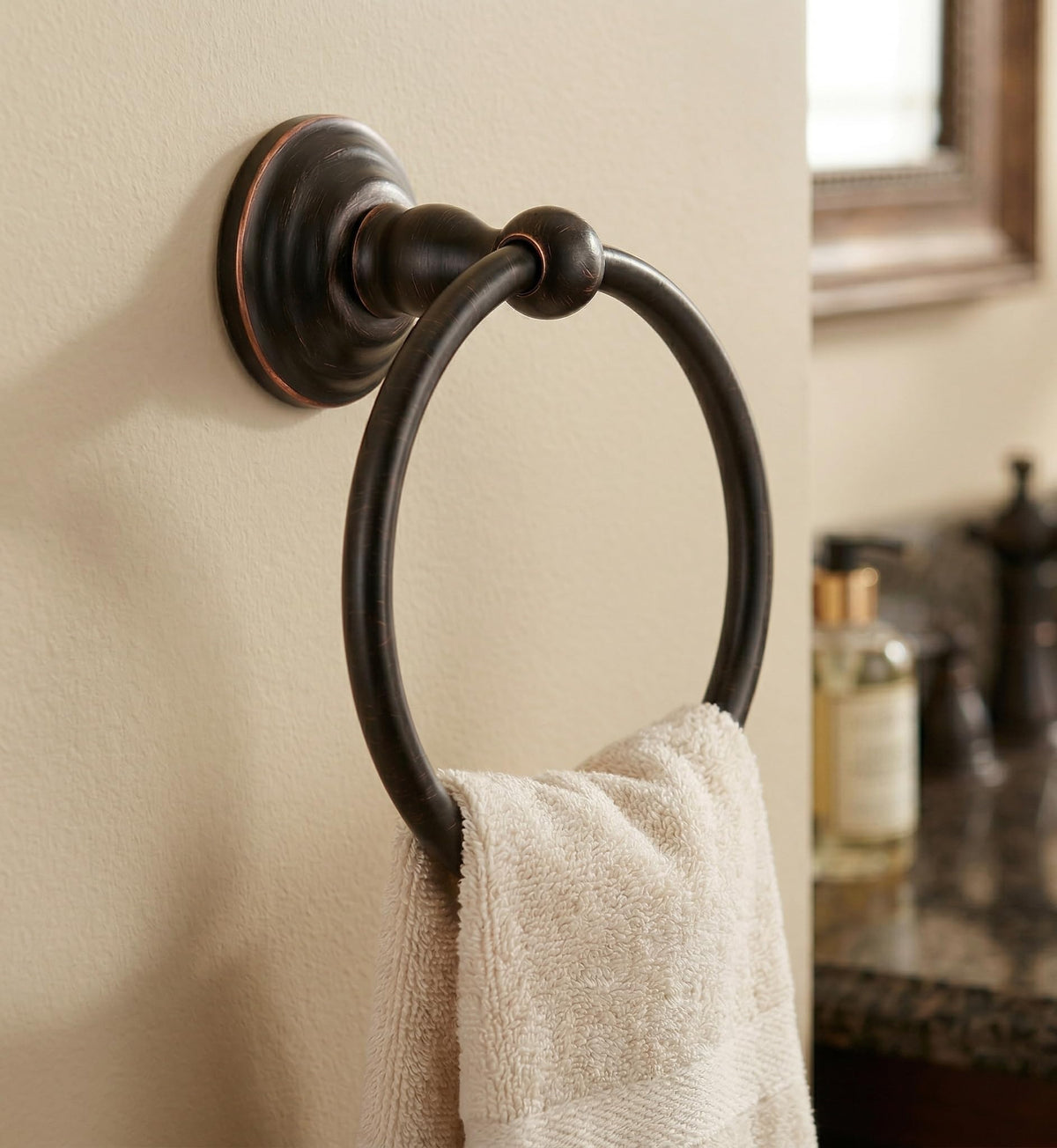 Designers Impressions concealed-screw-mount towel ring shows secure concealment and clean lines