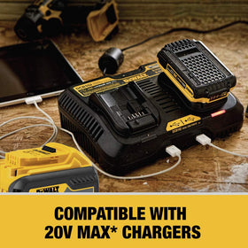 DEWALT 12Ah battery compact design beside charger