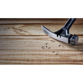 On-site workflow showing hammer ready for framing tasks
