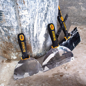 DEWALT 6-inch soft grip putty knife for comfortable detailing.