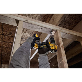 DEWALT DCD799B tight-space use demonstrates accessible drilling in cramped locations.