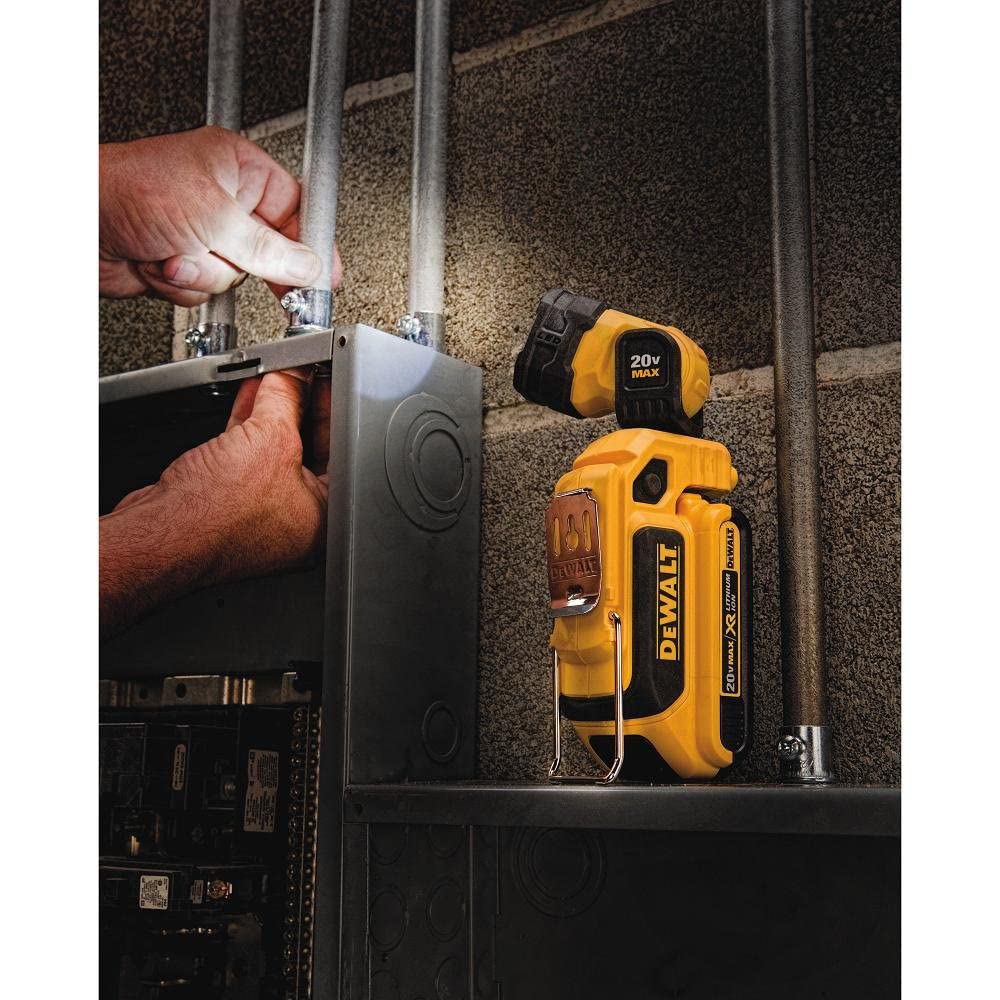 DEWALT DCL044 compact light in action in a workshop setting