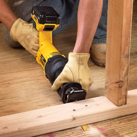 DEWALT DCS380P1 cordless saw in action enabling versatile cuts.