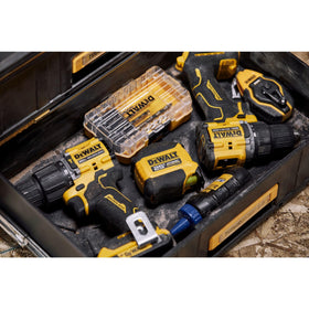 DEWALT drill bit in use, suitable for plastic, wood, and metal projects