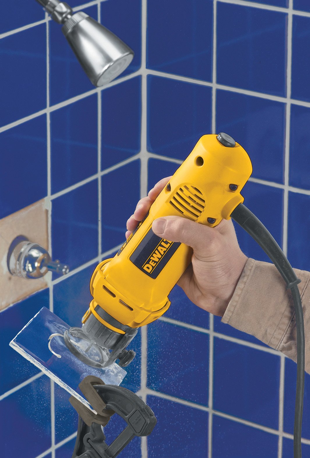 Tool-free bit change on the DEWALT DW660 speeds setup