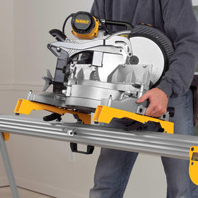 Easy-release clamps on DEWALT DW7231 brackets enable quick tool changes.
