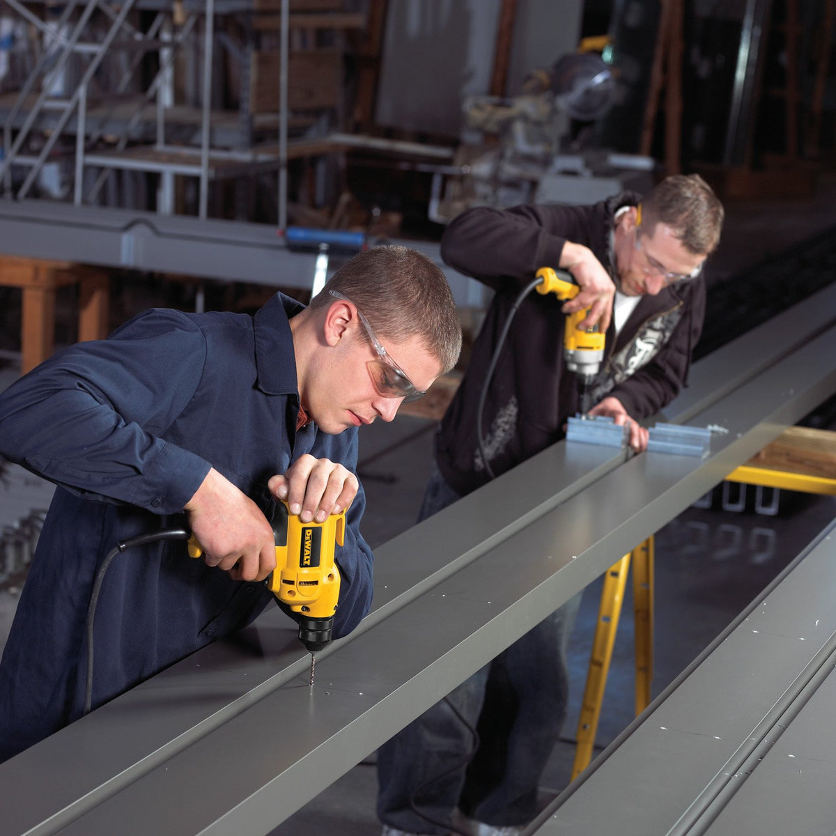 DEWALT DWD115K VSR trigger enables precise speed control for drilling and fastening.