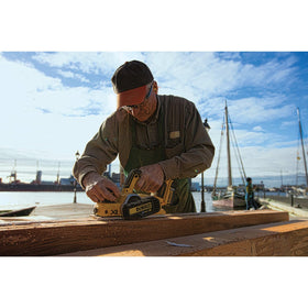 Depth adjustment knob detail on DEWALT DCP580B enables precise 1/256 in control.