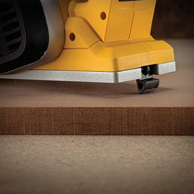 Kickstand in use on DEWALT DCP580B prevents gouging during setup.