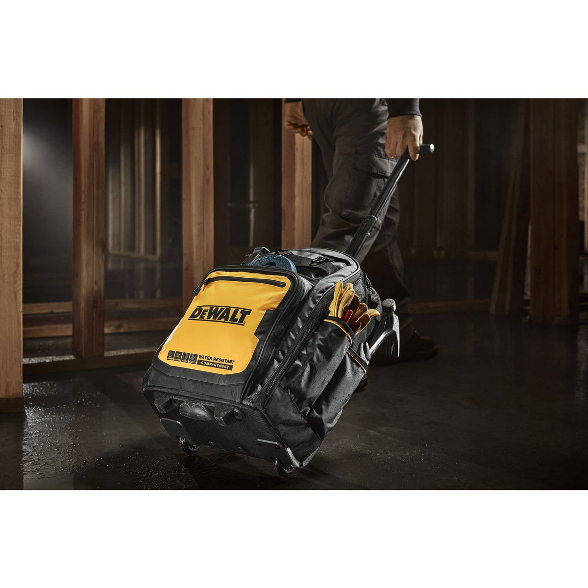 DEWALT Pro Backpack on Wheels IP54 compartment guards valuables from rain and dust.
