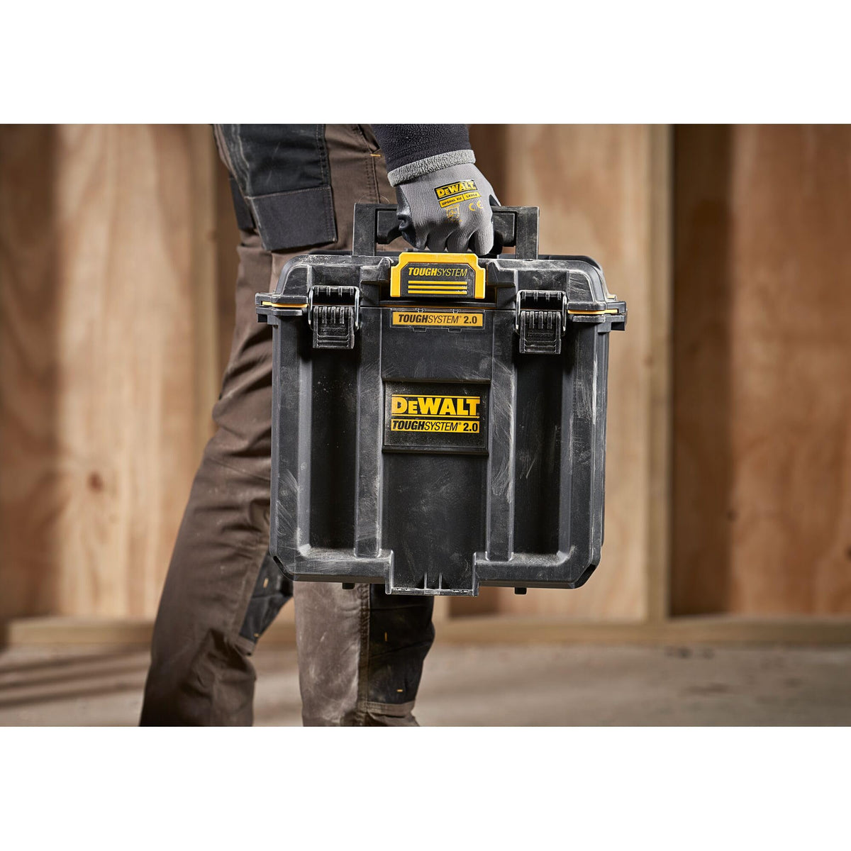 DEWALT TOUGHSYSTEM 2.0 shown on a rugged site with gear.