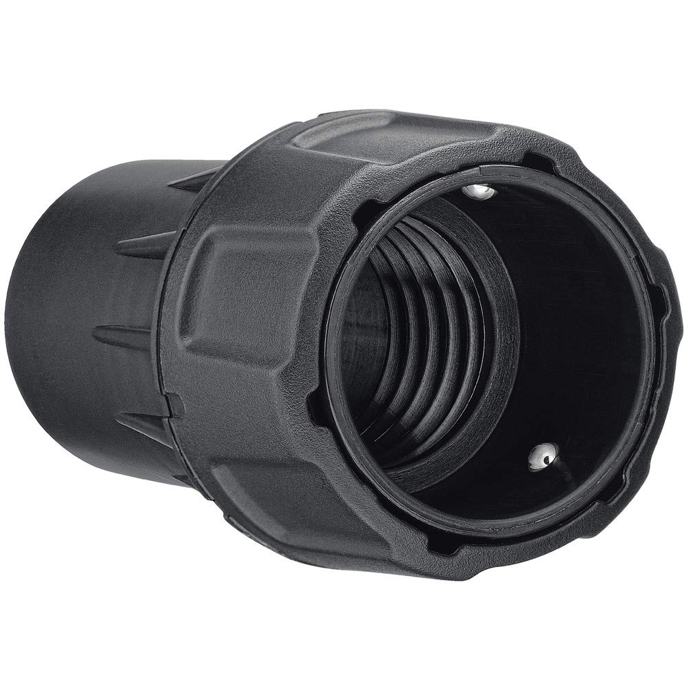 DEWALT universal tool connector attached to dust port for stable, kink-free operation.
