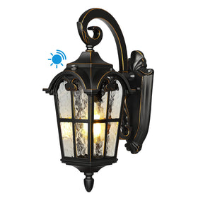 DEWENWILS dusk to dawn wall light front view with ripple glass and black Roman finish, curb appeal