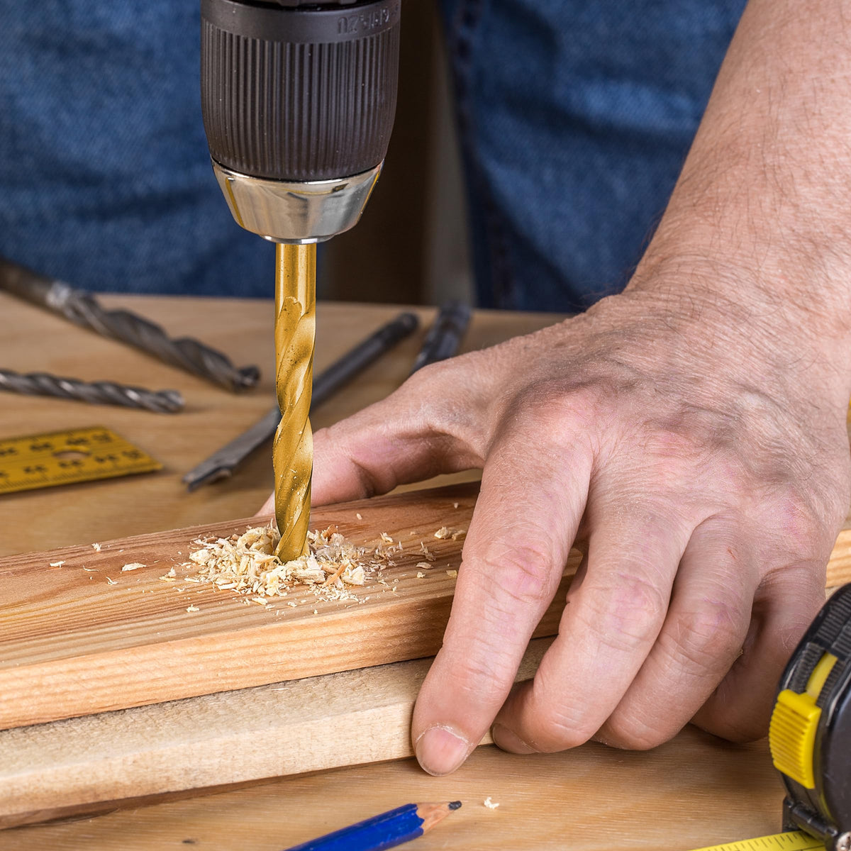 DF Dualferv left-hand drill bits in use on metal surface showing durability