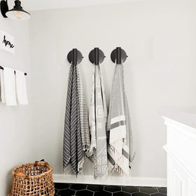 DGYB black wall towel hook mounted on smooth surfaces.