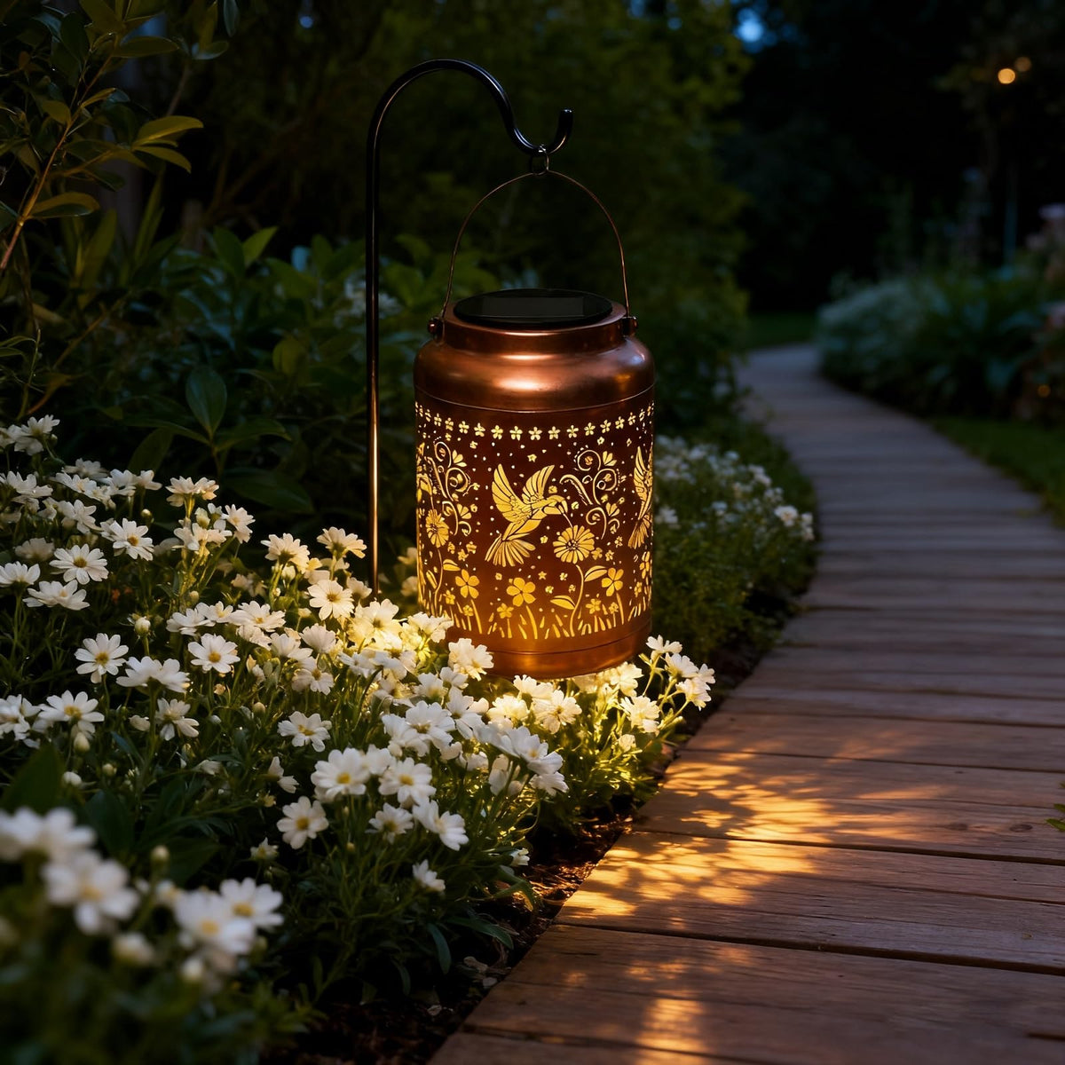 Dialan's hummingbird solar lantern casts warm light over the backyard seating area.