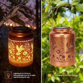 Dialan's hummingbird lantern with gold copper finish brightens a patio at night.