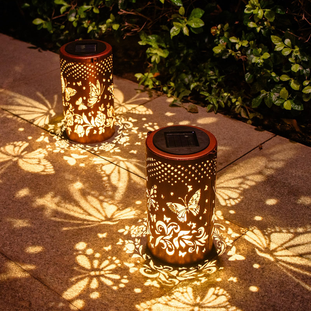 DIBIEECN two-pack butterfly lanterns create warm garden ambiance