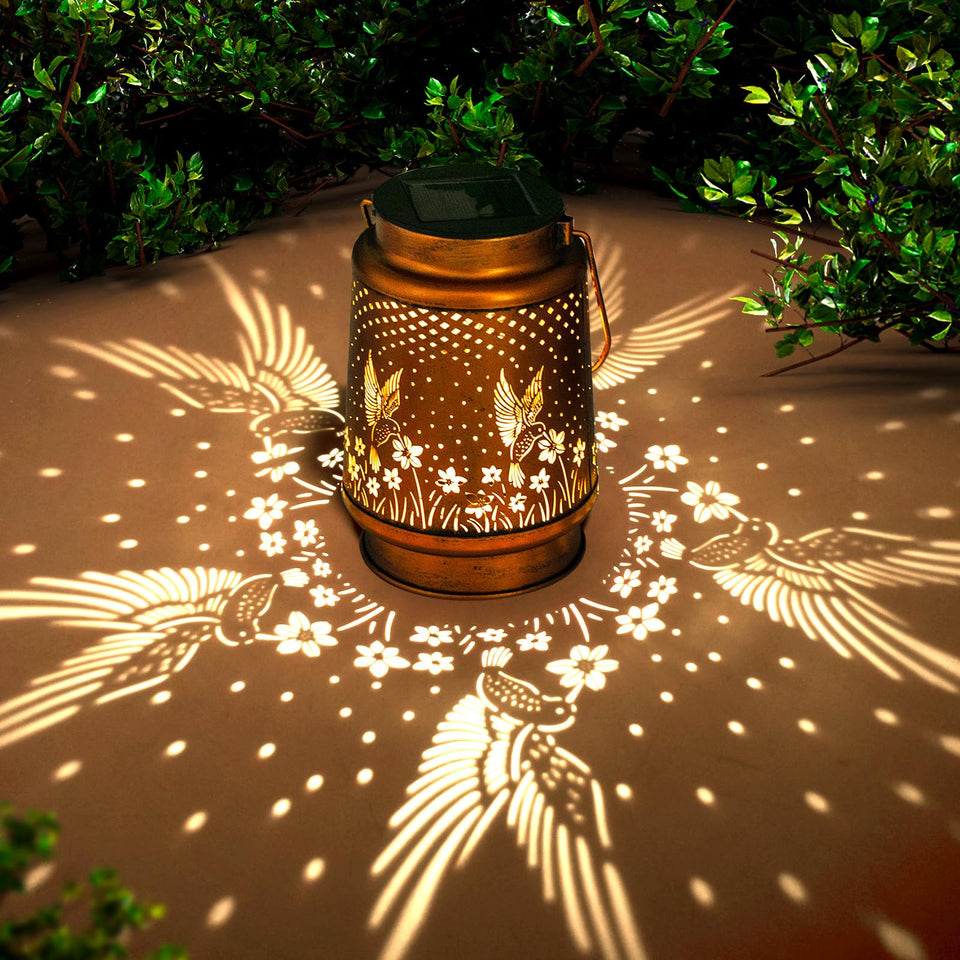 DIBIEECN solar hummingbird lantern front view glowing for outdoor spaces