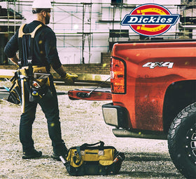Dickies accessory grommet for quick-clip storage and organization.