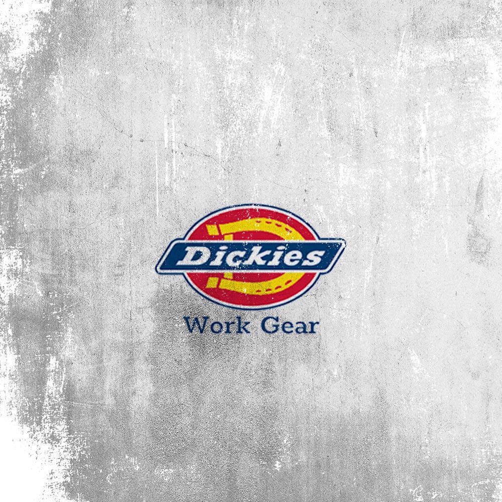 Dickies waist-worn apron on model demonstrates versatile hands-free tool carry.