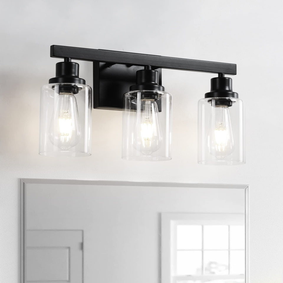 DIKAIDA 3-light bathroom fixture with clear glass shades adds brightness and classic style.