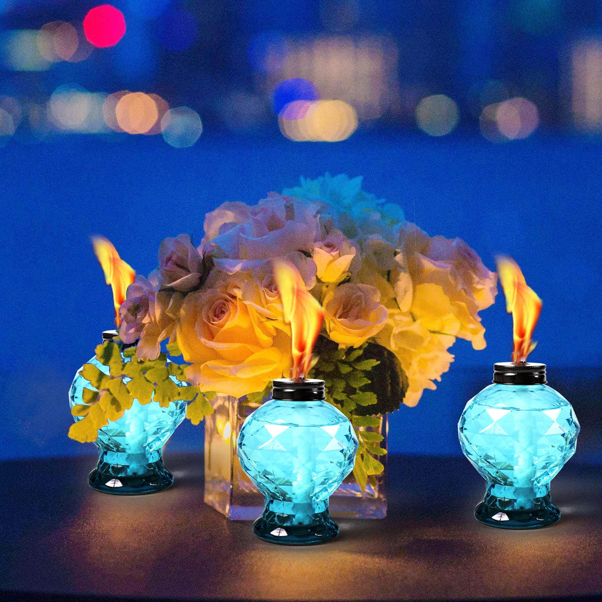 DIKAIDA 4-pack glass table torch showing wick and snuffer for easy lighting