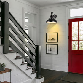 Diyel LED-compatible outdoor sconce supports energy-efficient lighting.