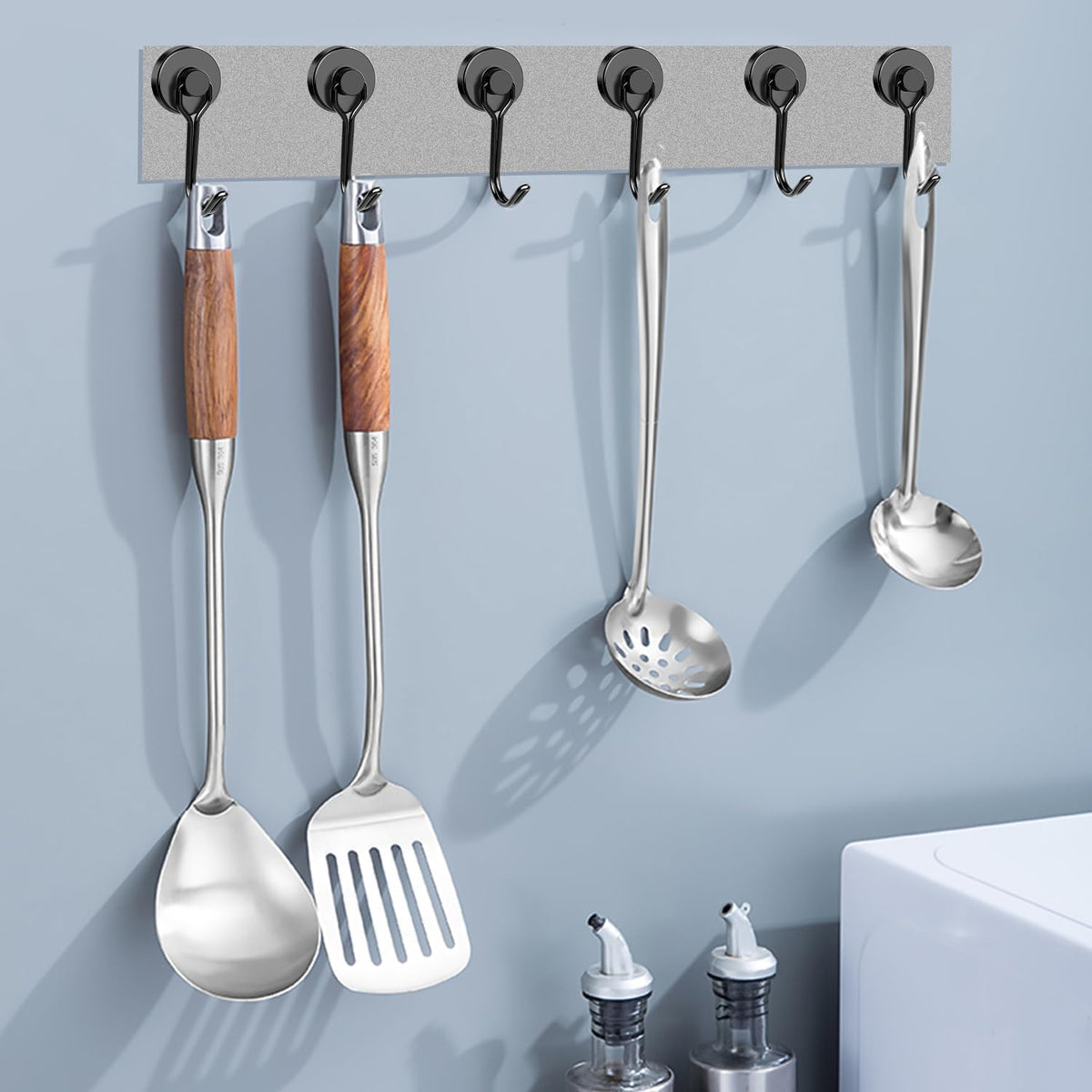 DIYMAG magnetic hook used to hang tools and towels.