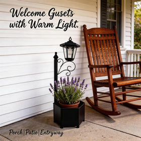 DJGIFI planter-integrated lamp post supports flowers and greenery beside doors.