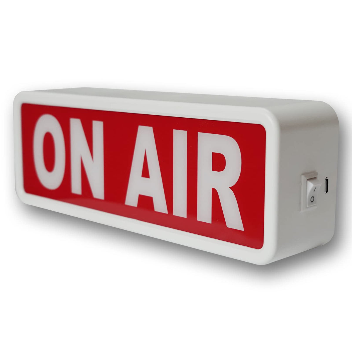 DMKYDM On Air sign light in a studio setup enhancing streaming backdrop