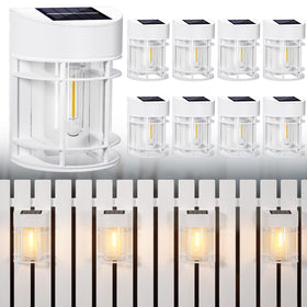 DOESLAG solar fence lights on deck create gentle night-time illumination.