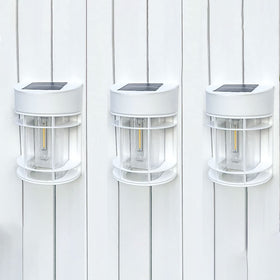 DOESLAG solar fence lights on a fence post provide warm ambience and safety.